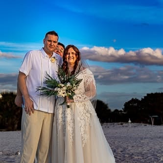 Bride and groom portrait on the beach