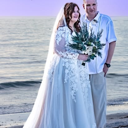 Bride and groom beach wedding ceremony