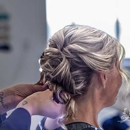 Blonde woman with braided updo hairstyle