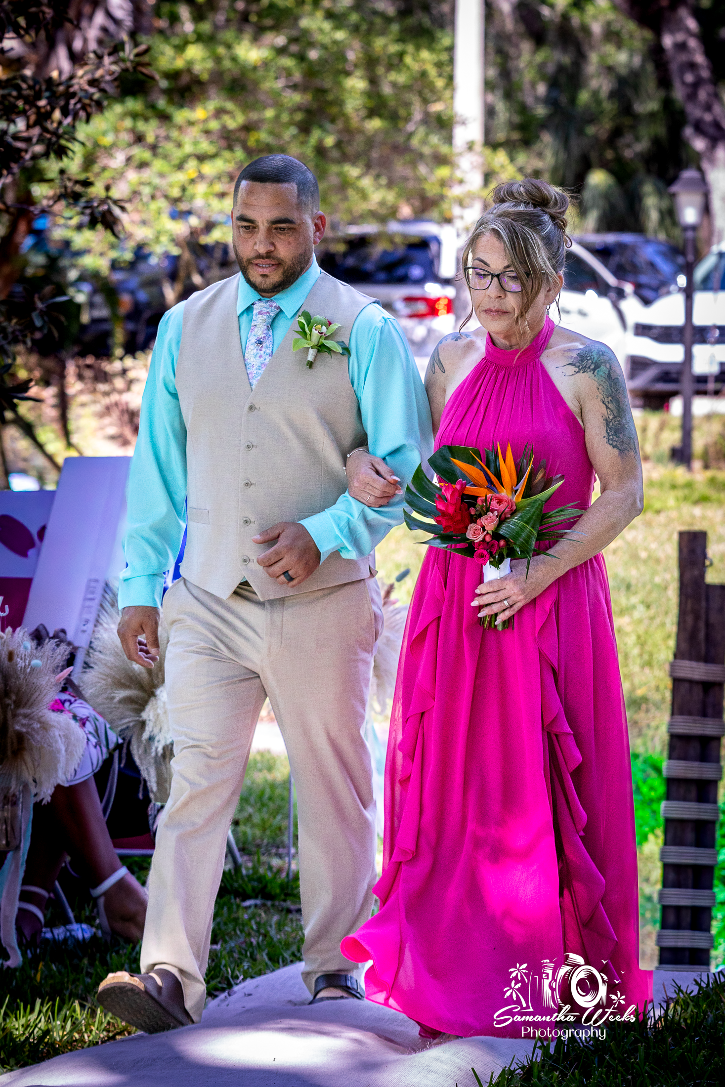 Couple walking outdoor wedding ceremony
